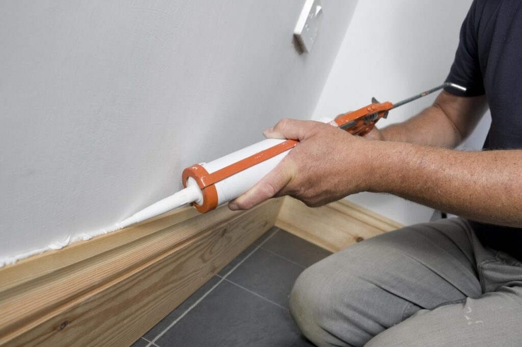 Apply Caulk to the Baseboards