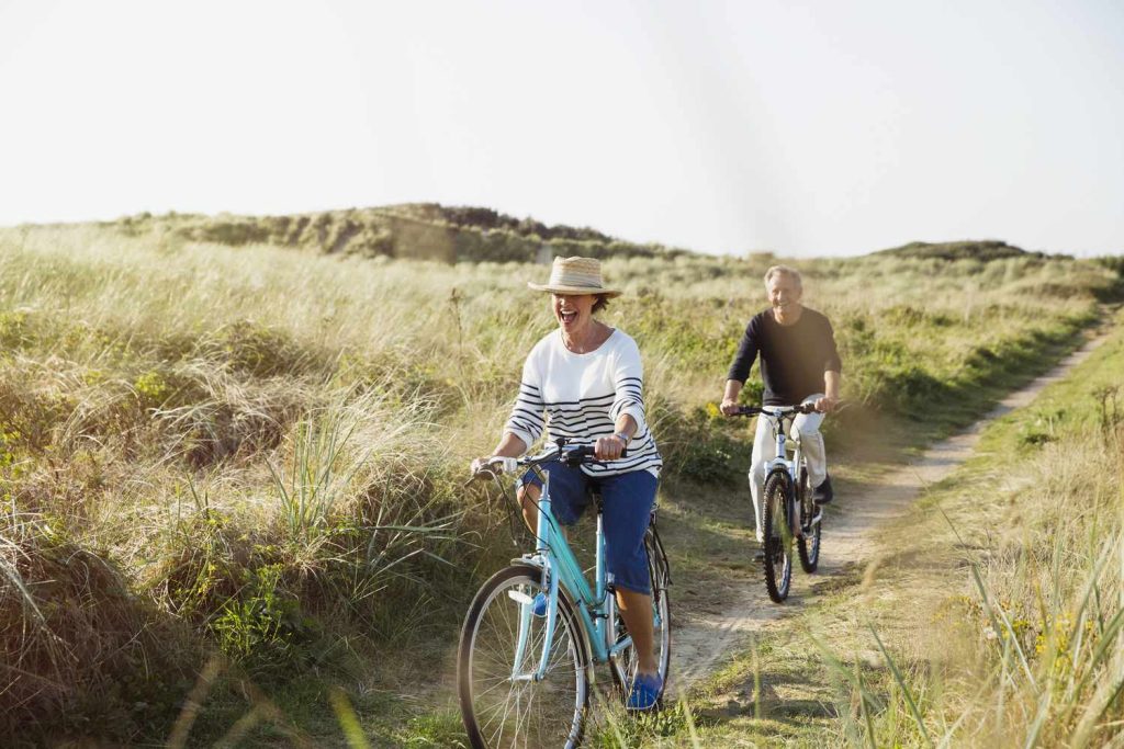 Retired
couple riding bicycle